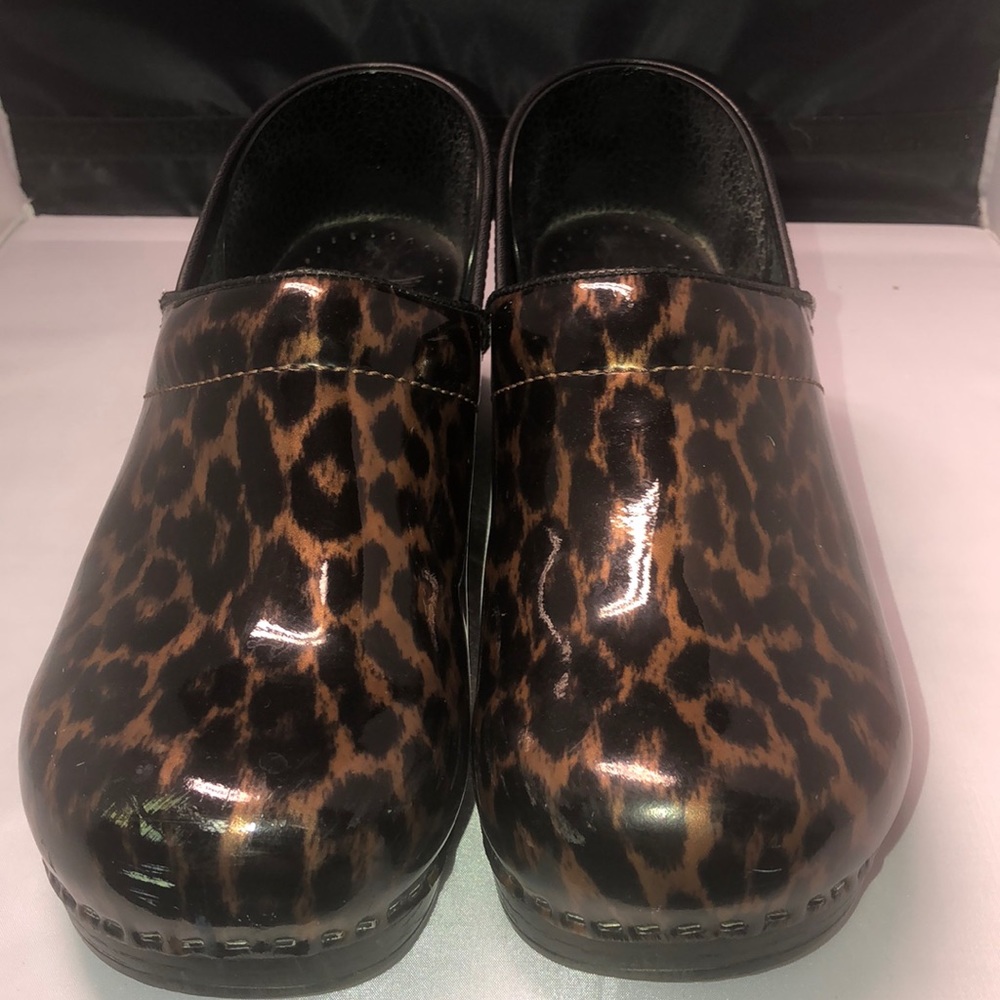 Dansko leopard print clogs.